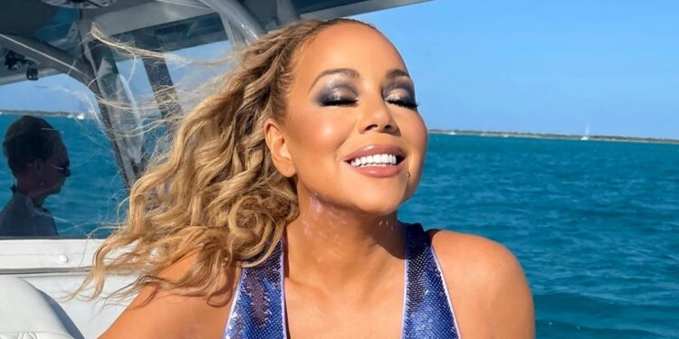 Mariah Carey Sparkles in Blue as She Celebrates Her 55th Birthday | Us Weekly